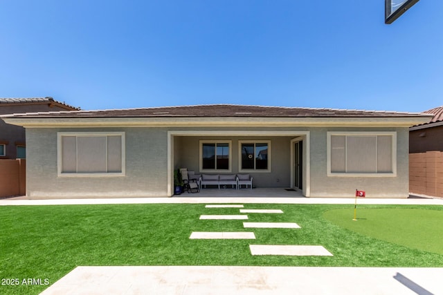 11015 E Texas Ave, Mesa, AZ 85212 - rear view of property with a patio, a putting green, and stucco siding