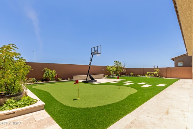 11015 E Texas Ave, Mesa, AZ 85212 - fenced backyard featuring a putting area