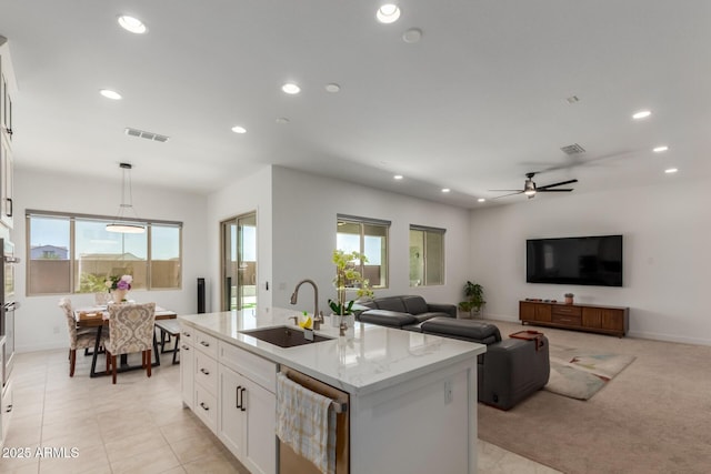 11015 E Texas Ave, Mesa, AZ 85212 - kitchen featuring stainless steel appliances, recessed lighting, an island with sink, plenty of natural light, and white cabinetry