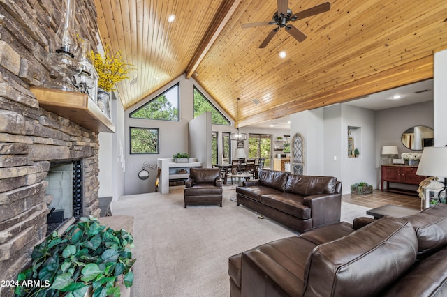 carpeted living room with beam ceiling, a fireplace, ceiling fan, and high vaulted ceiling