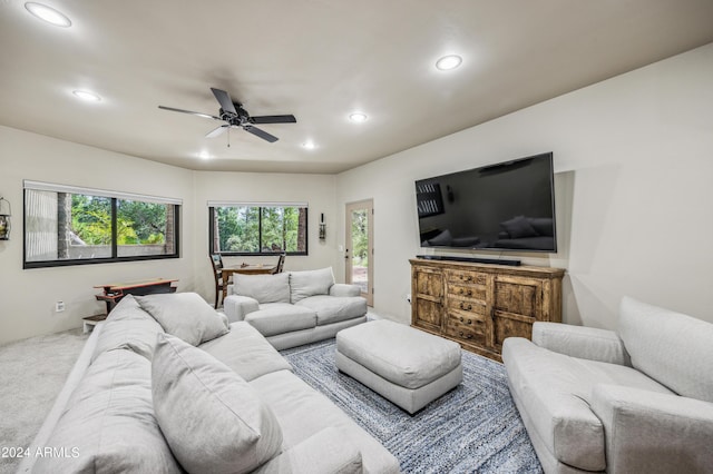 carpeted living room featuring a ceiling fan and recessed lighting