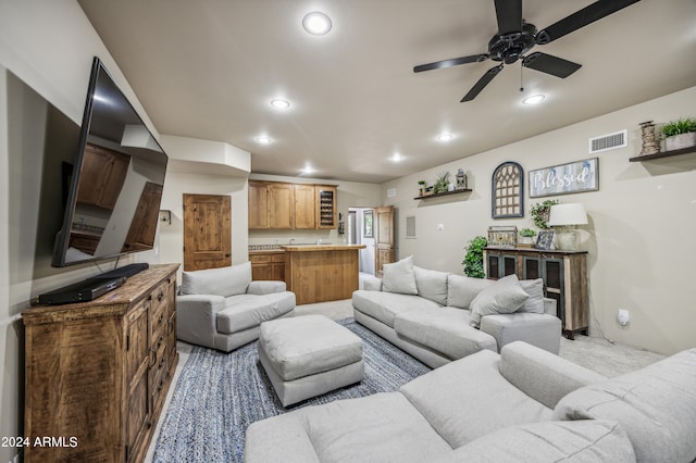 living room with ceiling fan