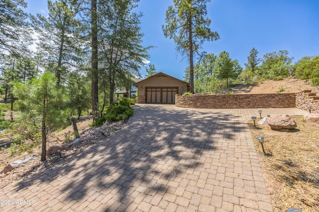 view of property exterior with a garage