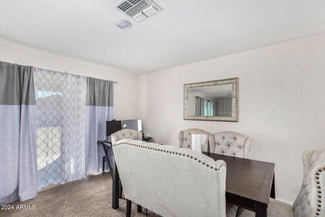 view of carpeted dining room