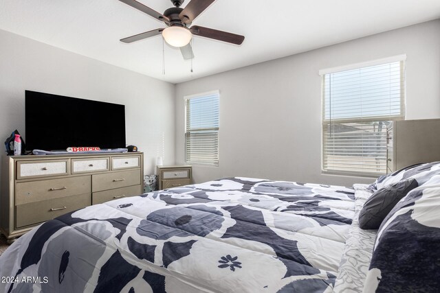 bedroom featuring ceiling fan