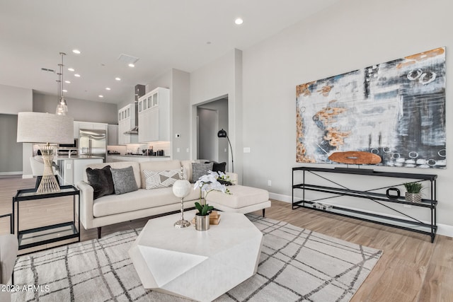 living room featuring light hardwood / wood-style floors