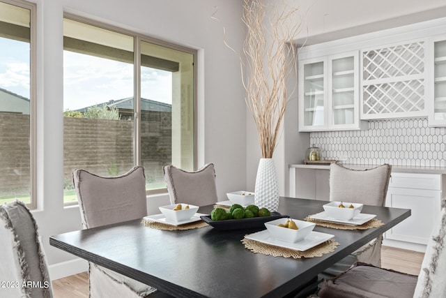 dining area with light hardwood / wood-style flooring