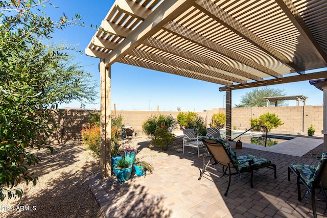 view of patio featuring a pergola