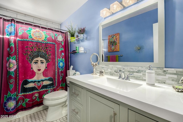 bathroom featuring tasteful backsplash, walk in shower, vanity, and toilet