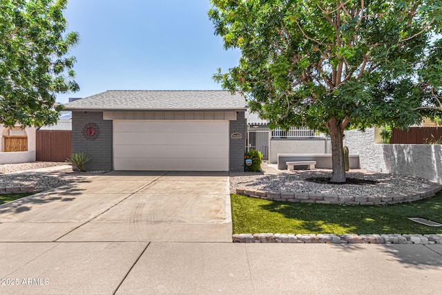9636 N 53rd Ave, Glendale, AZ 85302 - view of front of property with brick siding, driveway, and a shingled roof