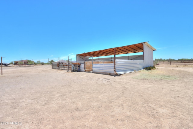 view of parking featuring a rural view