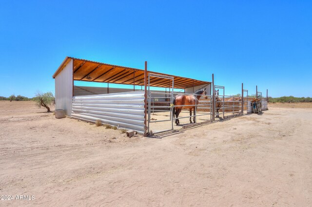 view of outbuilding with a rural view