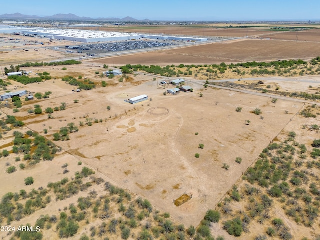 drone / aerial view featuring a mountain view and a rural view