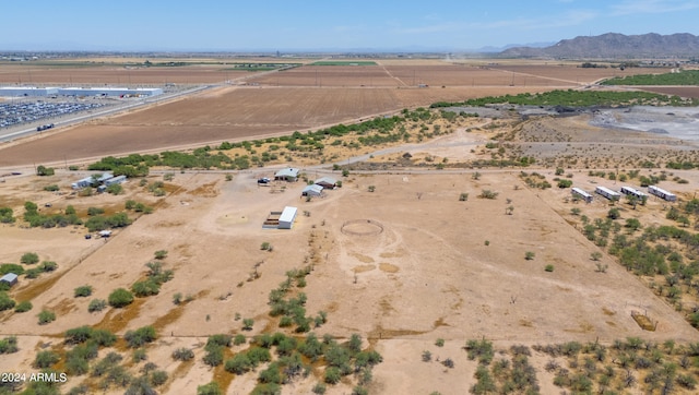 bird's eye view featuring a mountain view and a rural view