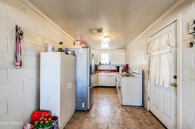 laundry area featuring crown molding and sink