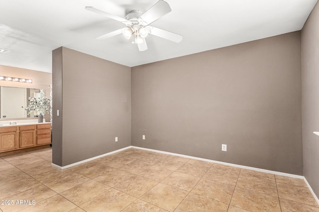 3006 W Matthew Dr, Phoenix, AZ 85027 - empty room with a ceiling fan, light tile patterned flooring, and baseboards