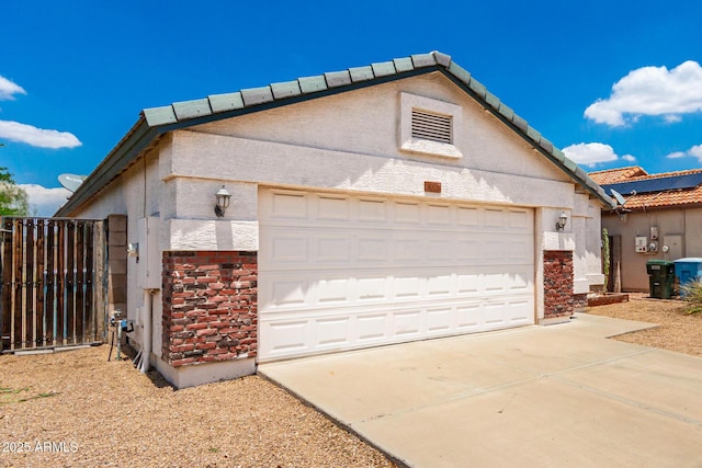 3006 W Matthew Dr, Phoenix, AZ 85027 - view of side of property with concrete driveway, brick siding, a tile roof, and stucco siding