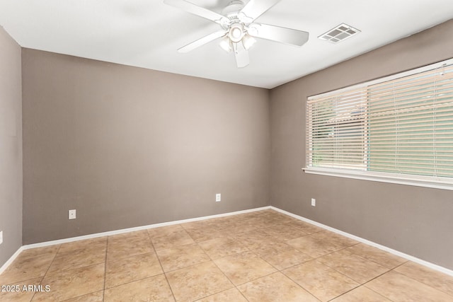 3006 W Matthew Dr, Phoenix, AZ 85027 - unfurnished room with ceiling fan, light tile patterned flooring, and baseboards