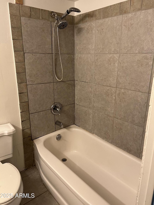 full bathroom featuring tile patterned flooring, shower / tub combination, and toilet