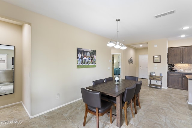 dining room with recessed lighting, baseboards, and visible vents