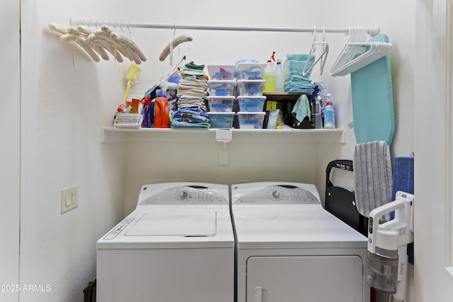 laundry room with washing machine and dryer and laundry area