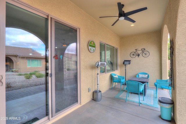 view of patio / terrace featuring a ceiling fan