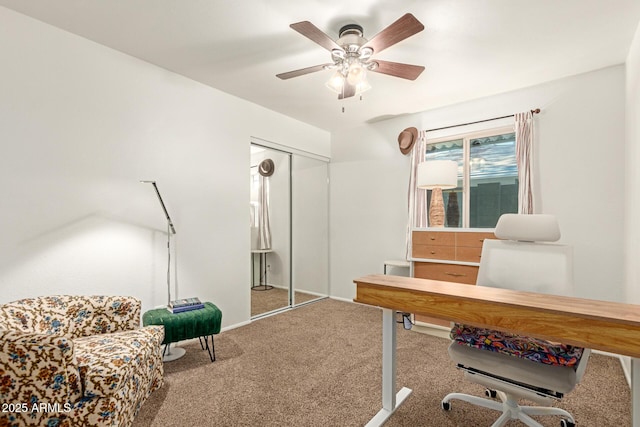 office featuring carpet and ceiling fan