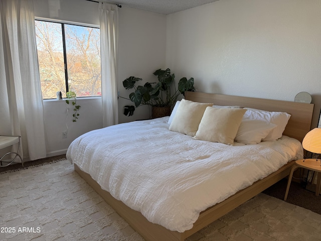 bedroom with multiple windows