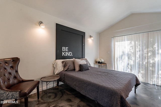 bedroom with lofted ceiling