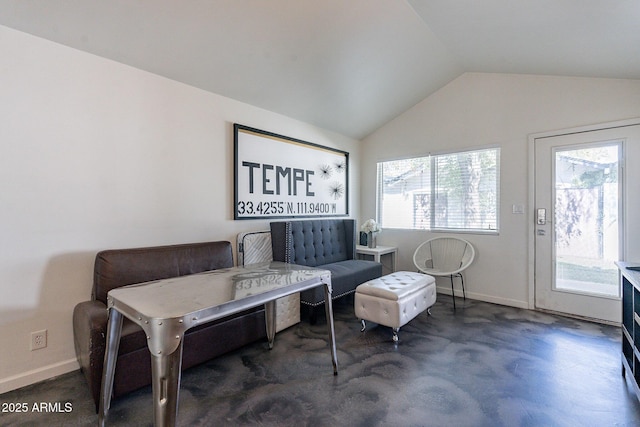 living room featuring vaulted ceiling