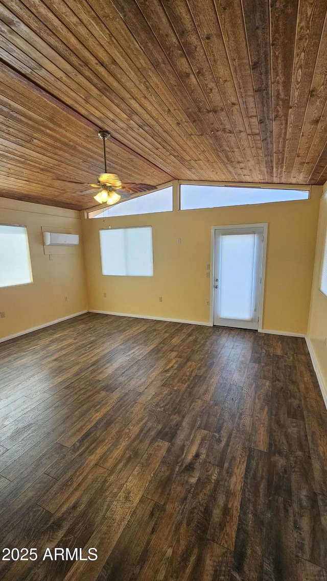 unfurnished room with a healthy amount of sunlight, dark hardwood / wood-style flooring, and wooden ceiling