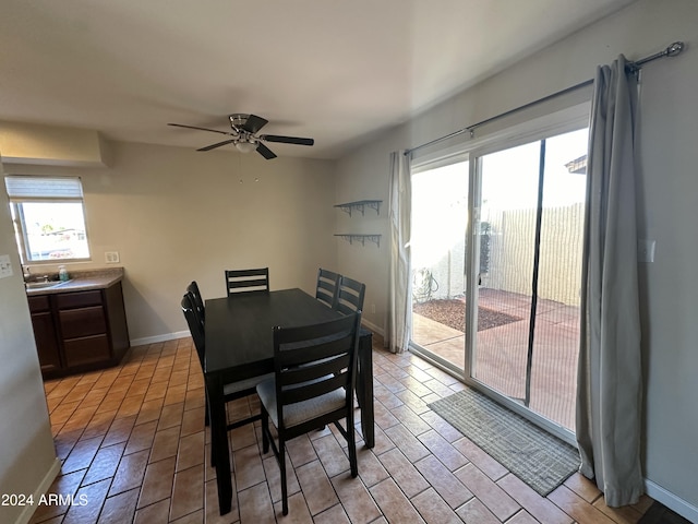 dining area with ceiling fan