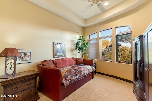 interior space with light colored carpet and ceiling fan