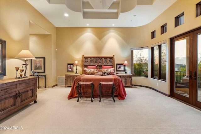 bedroom featuring light carpet, a high ceiling, access to outside, and ceiling fan