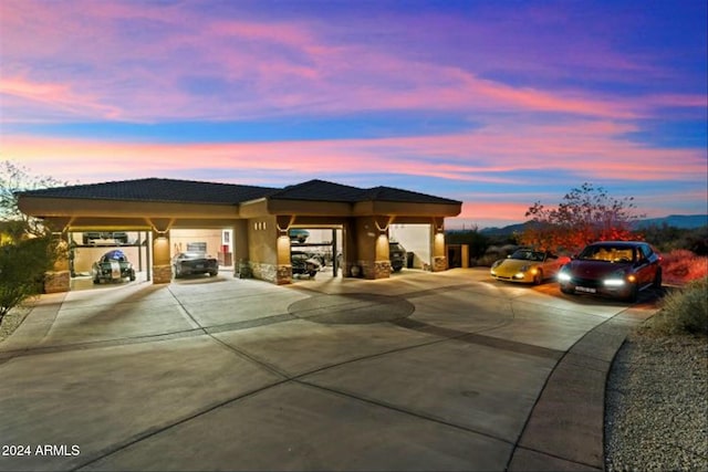 view of parking at dusk