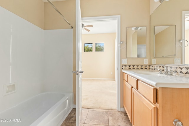 bathroom with ceiling fan, tile patterned flooring, vanity, and bathtub / shower combination