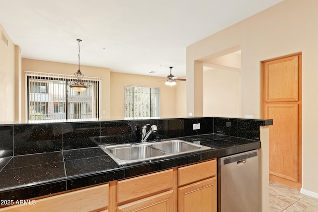 kitchen featuring dishwasher, light brown cabinets, sink, ceiling fan, and light tile patterned floors