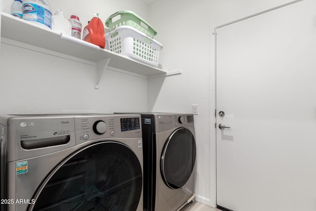 laundry room featuring independent washer and dryer