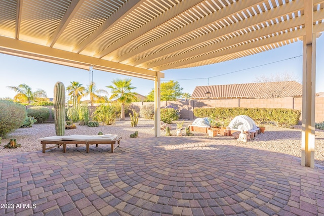 view of patio / terrace featuring a pergola and a fenced backyard