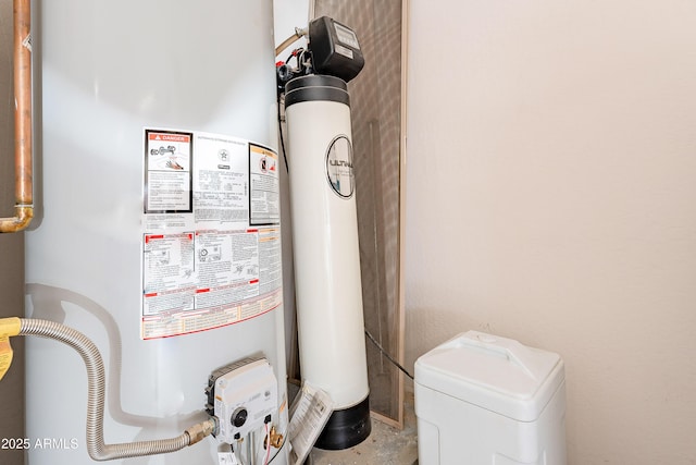 utility room with gas water heater