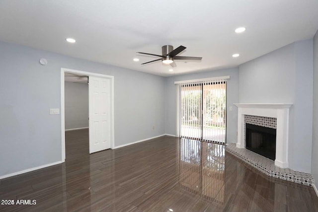 unfurnished living room featuring recessed lighting, wood finished floors, baseboards, and ceiling fan