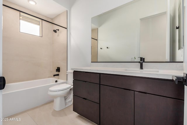 bathroom with toilet, tile patterned flooring, vanity, and bathing tub / shower combination