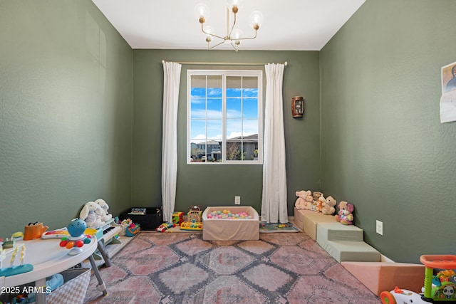 playroom with a notable chandelier