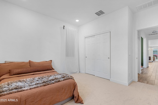 bedroom featuring a closet and carpet