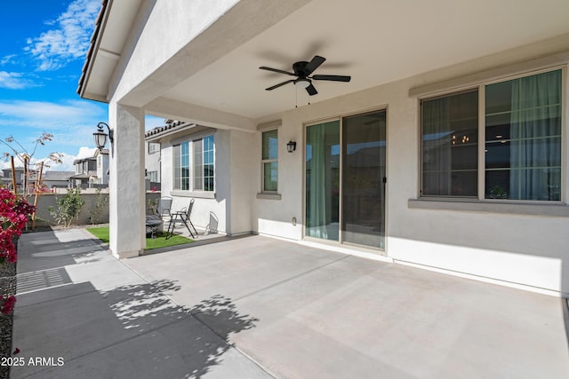 view of patio / terrace featuring ceiling fan