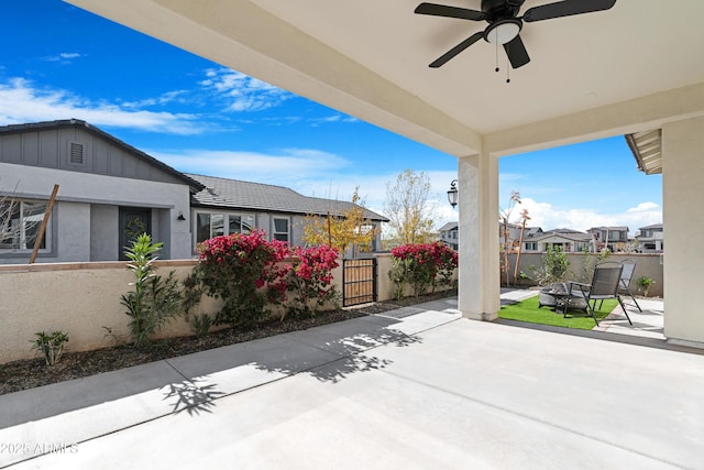 view of patio with ceiling fan