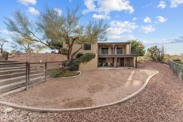 rear view of property with a patio area