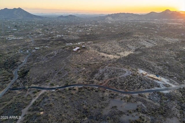 aerial view at dusk with a mountain view