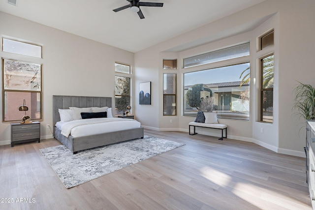 bedroom featuring ceiling fan and light wood-type flooring