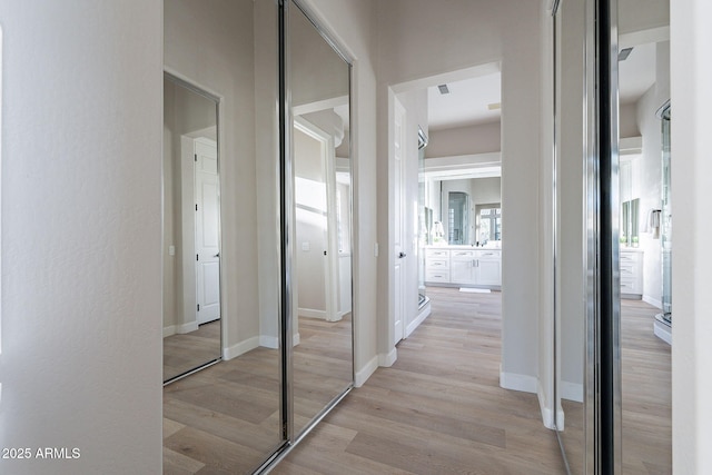 hallway featuring light hardwood / wood-style floors